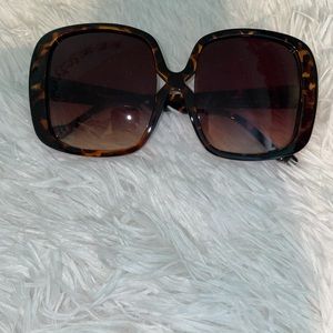 Over sized brown glasses